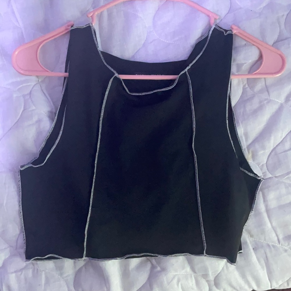 black tank with white stitching